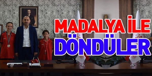 MADALYA İLE DÖNDÜLER