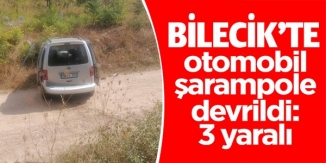 BİLECİK'TE OTOMOBİL ŞARAMPOLE DEVRİLDİ: 3 YARALI